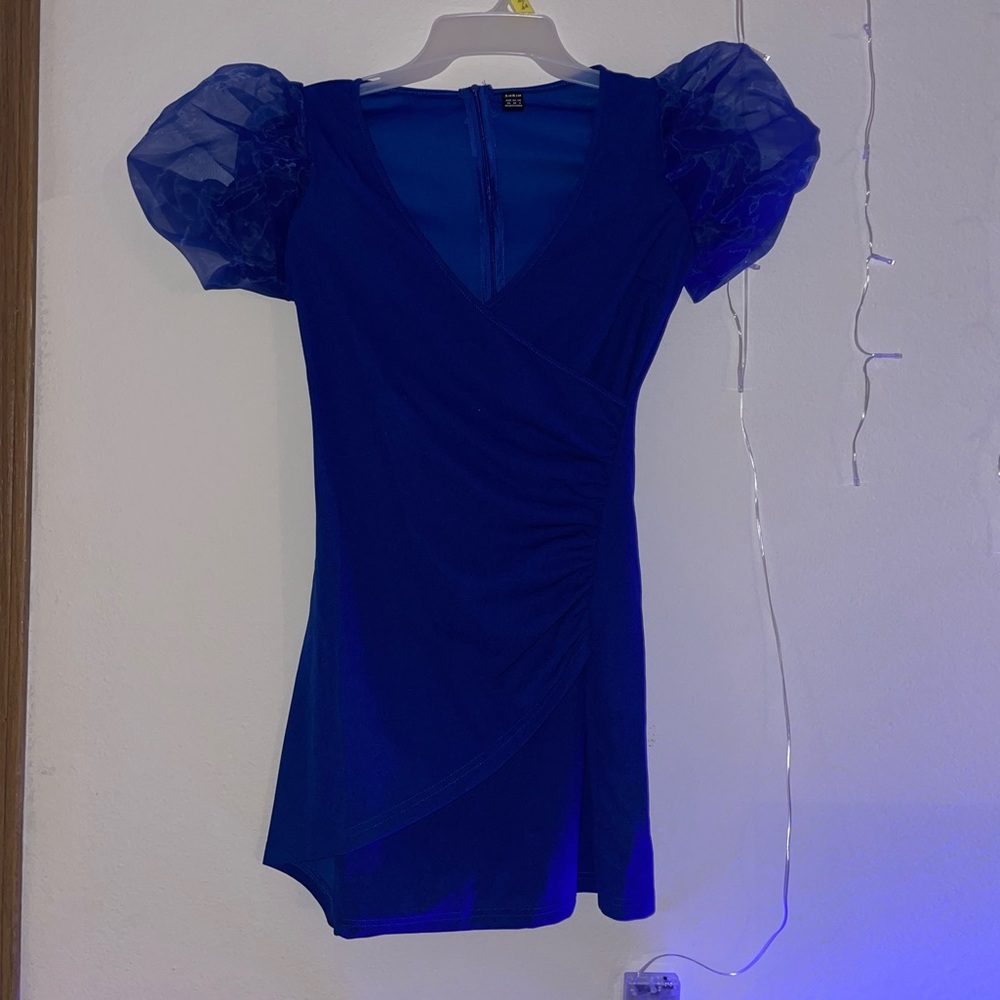 dark blue dress with crossing front & puffy sleeves